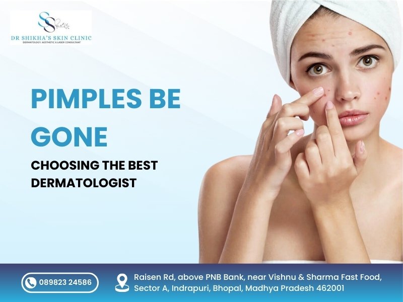 A woman with pimples on her face points to a blemish. Text reads "PIMPLES BE GONE: CHOOSING THE BEST DERMATOLOGIST" at Dr Shikha's Skin Clinic in Bhopal, with contact number and address.