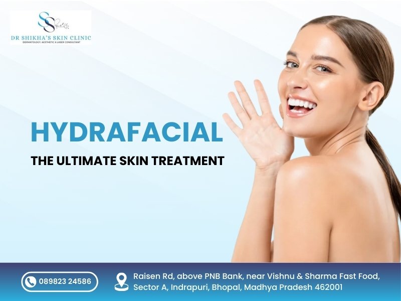 A woman with glowing skin smiles and touches her cheek. Text promotes "HYDRAFACIAL: THE ULTIMATE SKIN TREATMENT" at Dr Shikha's Skin Clinic in Bhopal, with contact number and address.
